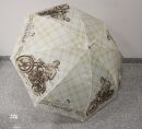Großer Sausebub Regenschirm im Oldtimer Motorrad...